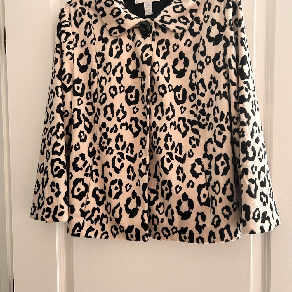 Chico’s faux fur leopard swing coat.